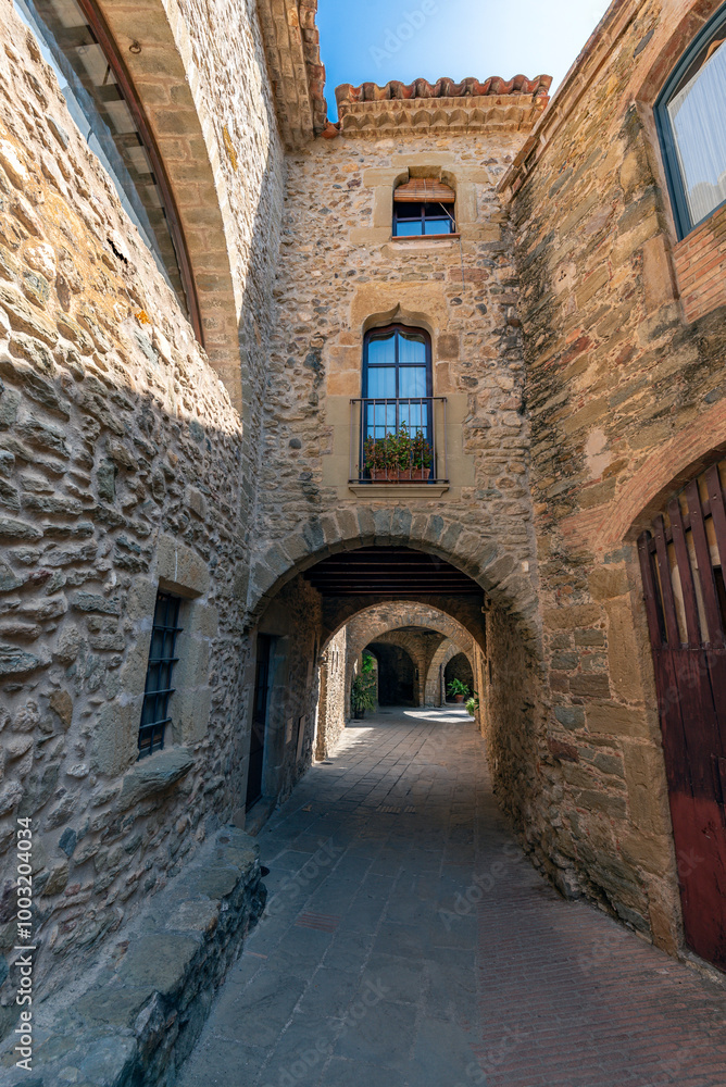 Picturesque medieval town of Monells. Girona, Costa Brava. Catalonia. Spain Picturesque medieval town of Monells. Girona, Costa Brava. Catalonia. Spain