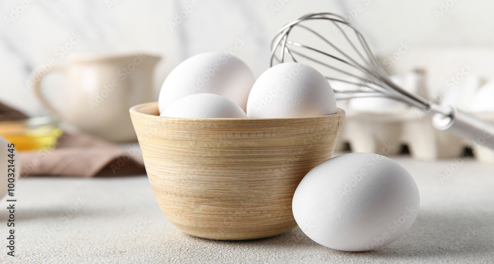 Bowl with raw chicken eggs on white background Bowl with raw chicken eggs on white background