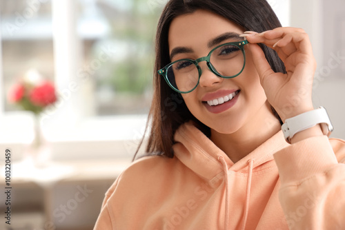 Beautiful happy young woman...