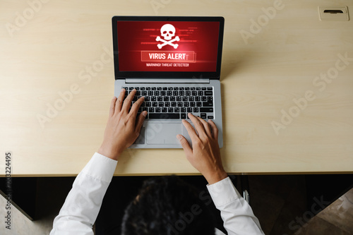 Virus warning alert on computer screen detected modish cyber threat , hacker, computer virus and malware