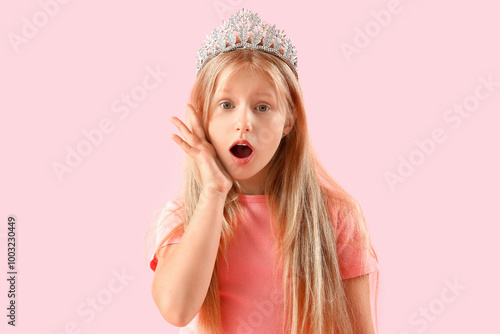 Shocked little girl in tiar...