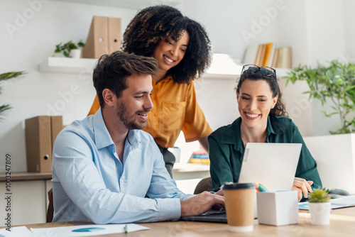 Business people working with laptop and talking of they new project together in the office.
