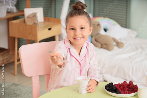 Cute little girl in pajamas...
