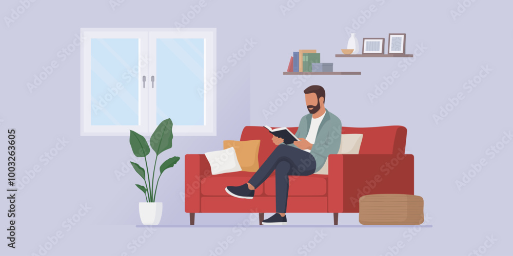 Man relaxing on the couch and reading a book Man relaxing on the couch and reading a book