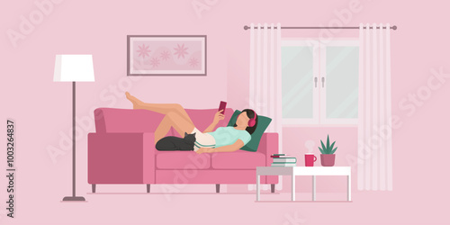 Girl relaxing on the couch and social networking on her smartphone