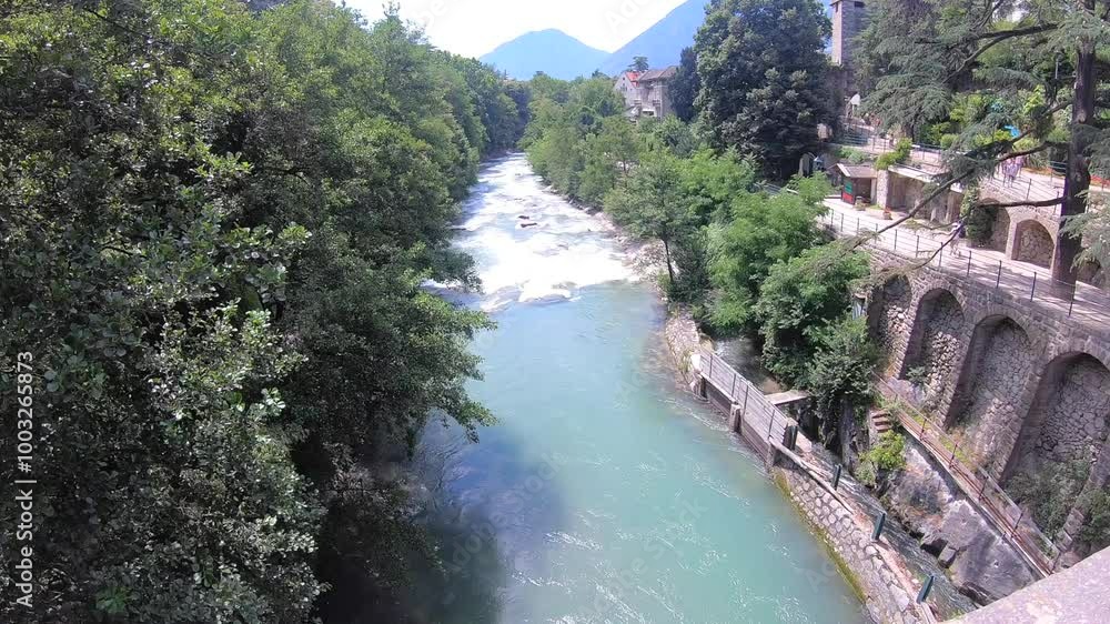 Passirio River flowing through Merano city center, South Tyrol, Italy Passirio River flowing through Merano city center, South Tyrol, Italy