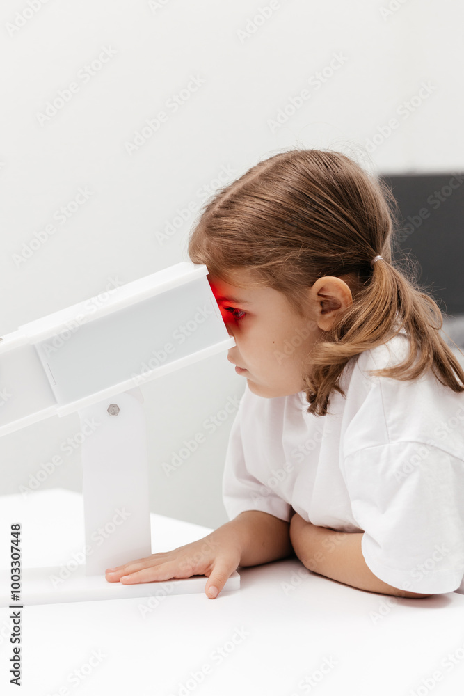 A young girl engages in orthoptic and pleoptic therapy using advanced vision stimulation equipment. Laser eye treatment promotes recovery and enhances vision in a soothing environment A young girl engages in orthoptic and pleoptic therapy using advanced vision stimulation equipment. Laser eye treatment promotes recovery and enhances vision in a soothing environment
