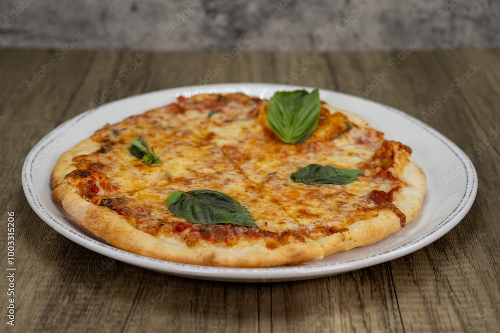 Margherita pizza cooked to perfection with extra crispy crust Margherita pizza cooked to perfection with extra crispy crust