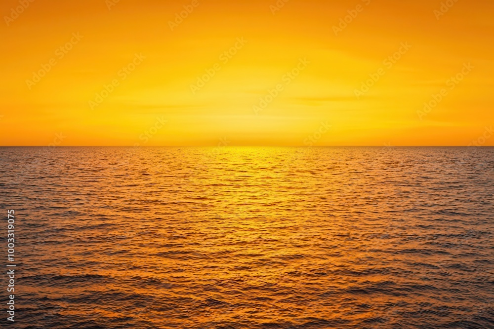 Fototapeta premium A golden sunset over a vast ocean, casting a warm glow, golden sunset, natural beauty
