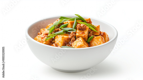 Delicious tofu dish garnished with green onions, featuring savory sauce and rich texture. Perfect for healthy meal option or vegetarian cuisine lovers.