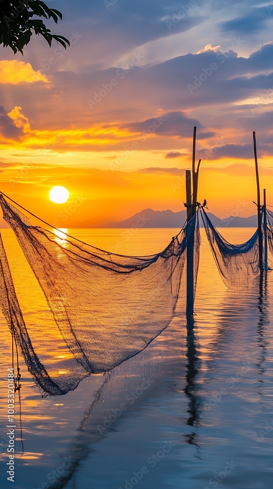 Fototapeta premium Pakoras breathtaking sunrise highlighting tranquil fishing dip nets picture