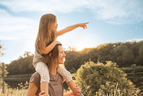 Εκτύπωση καμβά Mother and daughter exploring nature countryside together, mom giving her child