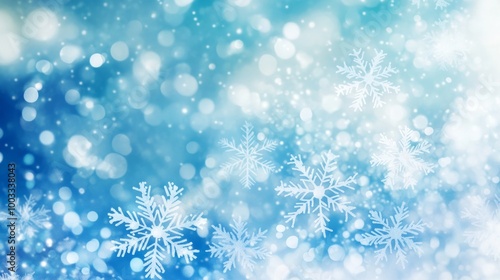 Snowflakes and bokeh lights on blue background