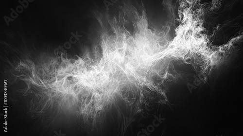 Abstract bursts of white light with soft edges fading into a deep black background.