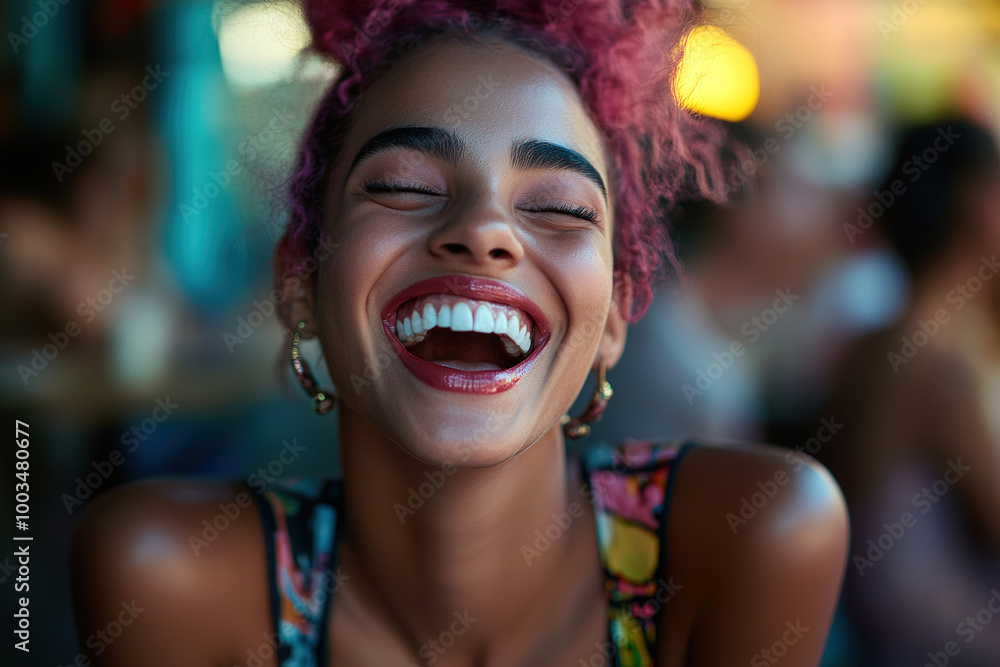 Close-up portrait of a laughing mixed-race woman with vibrant pink hair, wearing a colorful outfit in a coffee shop. The blurred background captures the lively atmosphere of patrons enjoying their tim Close-up portrait of a laughing mixed-race woman with vibrant pink hair, wearing a colorful outfit in a coffee shop. The blurred background captures the lively atmosphere of patrons enjoying their tim