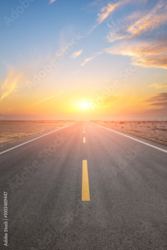 Asphalt highway road and desert with beautiful sky clouds natural landscape at sunset. Road trip.