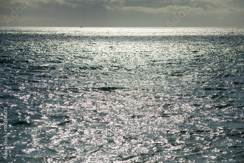 Sea water in rippled water detail background. Ocean waves pattern.