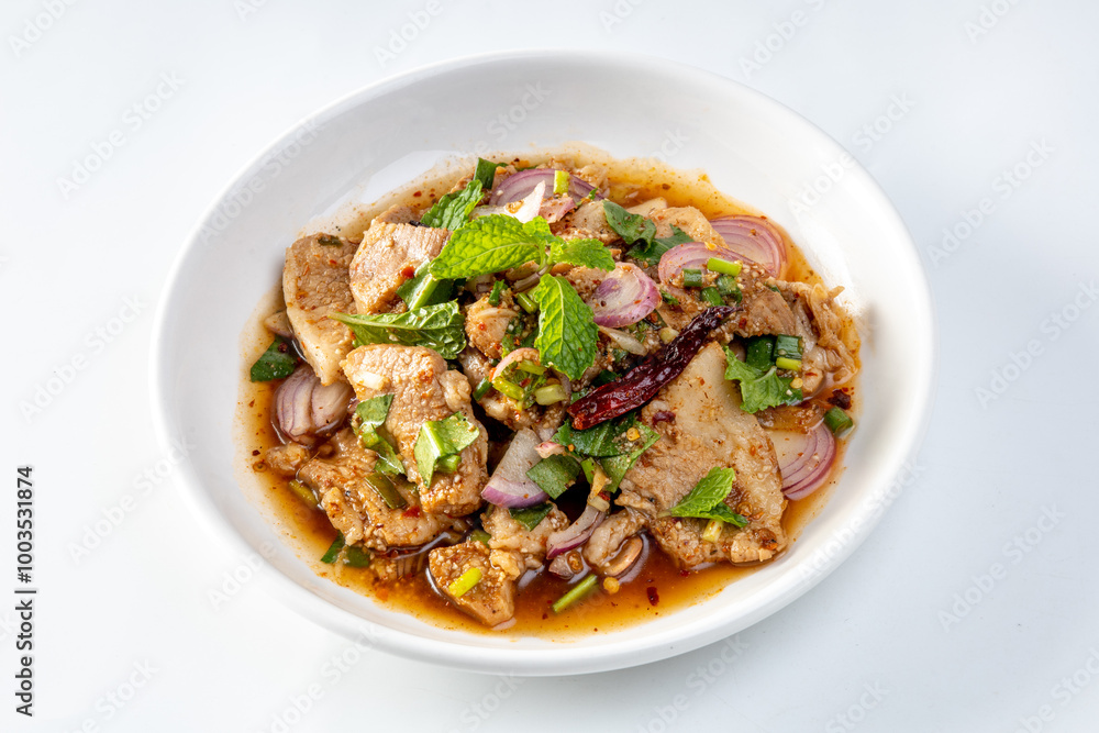 Grilled pork salad. on a white background Thai food. Isaan food. Grilled pork salad. on a white background Thai food. Isaan food.