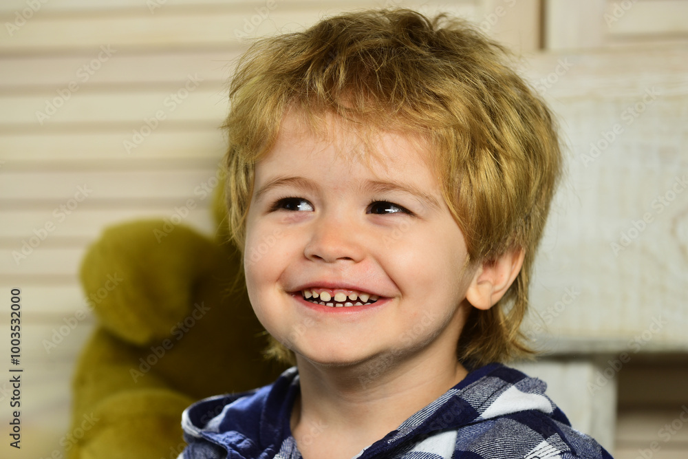 Portrait of a happy laughing child. Close up positive kids face. Portrait of a happy laughing child. Close up positive kids face.