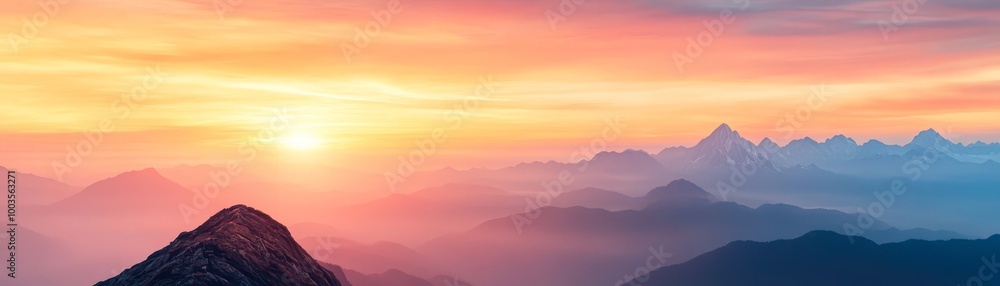 Obraz premium A breathtaking landscape featuring layered mountains under a vibrant sunset, perfect for use in travel blogs, nature paintings, calming backgrounds, or outdoor adventure promotions,