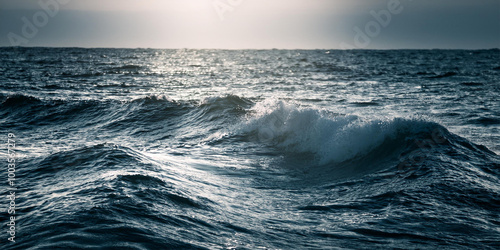 Background of big waves of water in the ocean with reflection of sunlight. photo