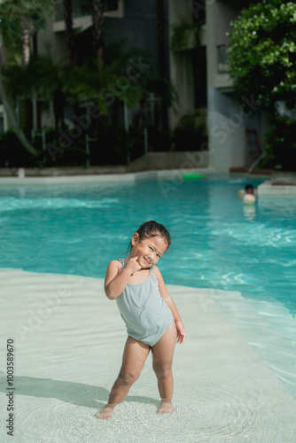 Girl playing in the pool