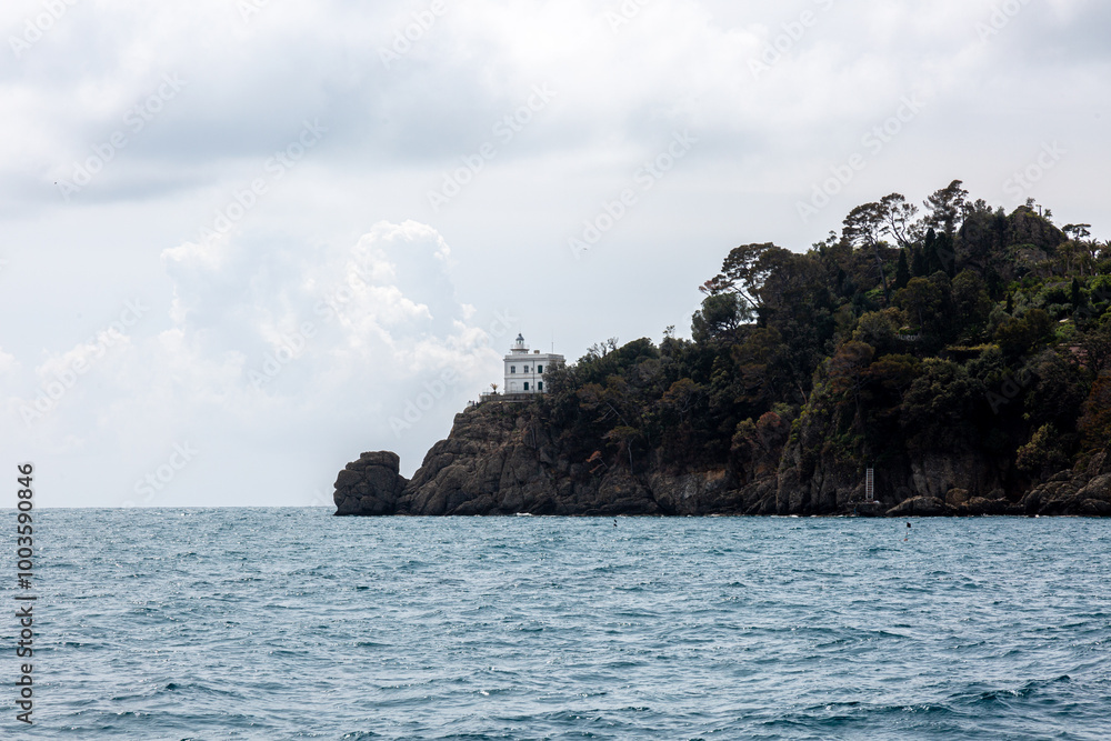 View to the shore near Portofino from the sea with dramatic sky View to the shore near Portofino from the sea with dramatic sky