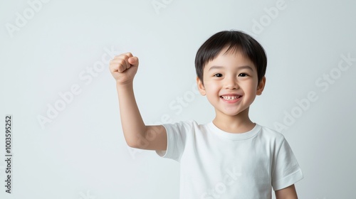 Asian boy with Victory Fist hand