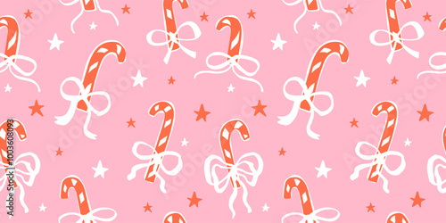 Seamless pattern with Cute doodle candy canes with bows.  Hand drawn vector illustration. Naive coquette core design. Funny Christmas background, wrapping paper.