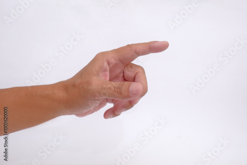 Closeup shot of left hand with fore finger pointing forward