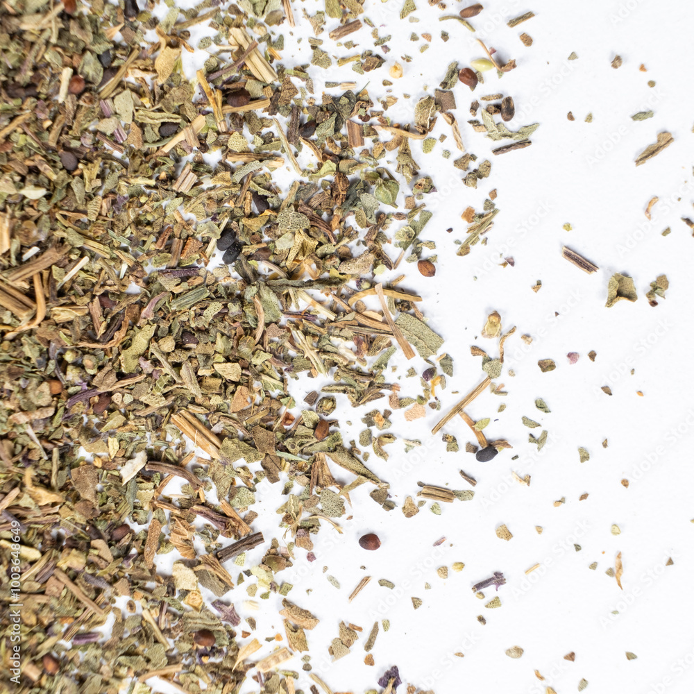 Dry basil spice seasoning macro texture on white background. Dry basil spice seasoning macro texture on white background.