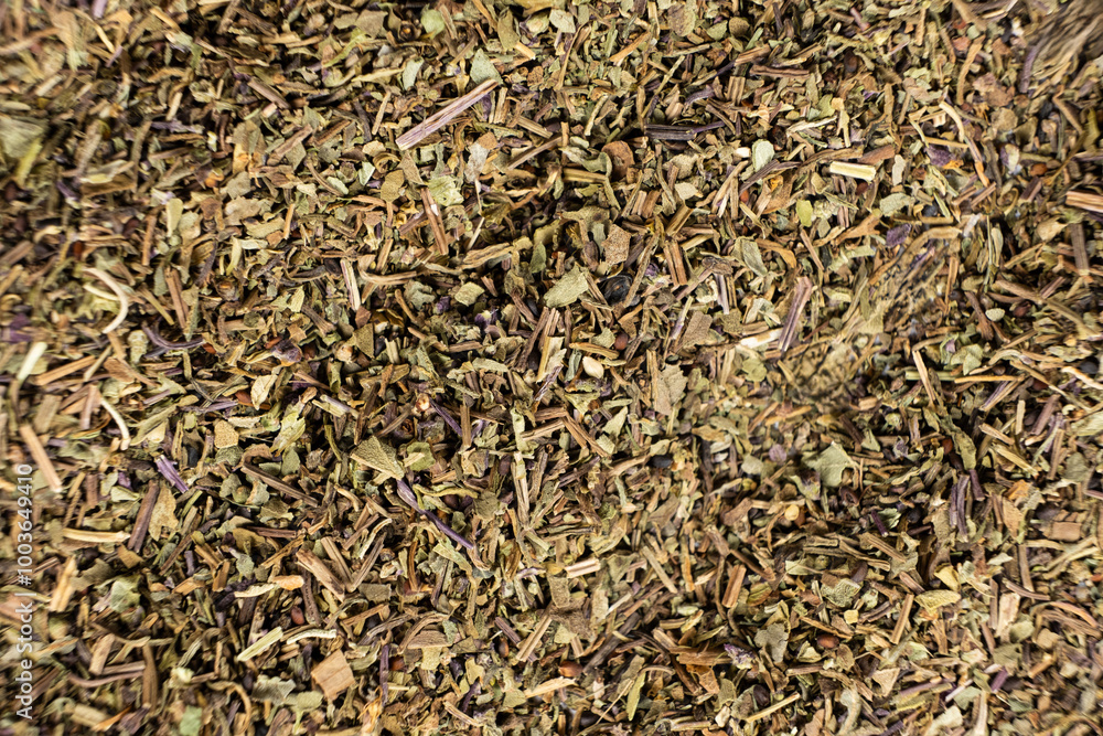 Dry basil spice seasoning macro texture top view Dry basil spice seasoning macro texture top view