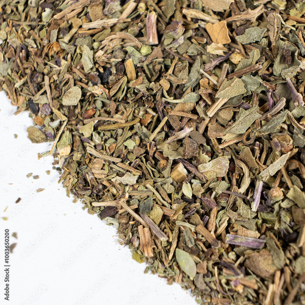 Dry basil spice seasoning macro texture on white background. Dry basil spice seasoning macro texture on white background.