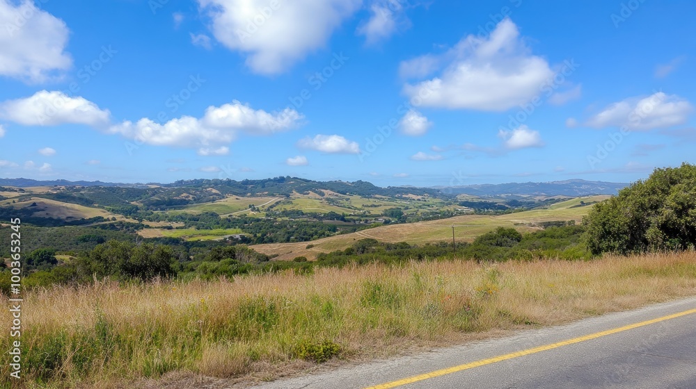 A scenic overlook along a highway, offering a panoramic view of rolling hills and valleys, perfect for travelers to stop and enjoy. A scenic overlook along a highway, offering a panoramic view of rolling hills and valleys, perfect for travelers to stop and enjoy.