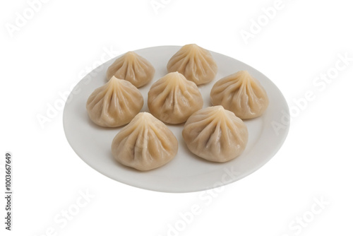 Steamed Dumpling Delight, Ganesh Chaturthi Modak Offerings, Modak Dumplings for Indian Celebrations, Traditional Modak Sweet Dessert Stock Photo.