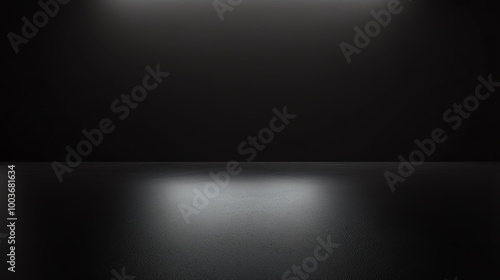 A minimalist black background with subtle reflections, perfect for showcasing products or creative designs.