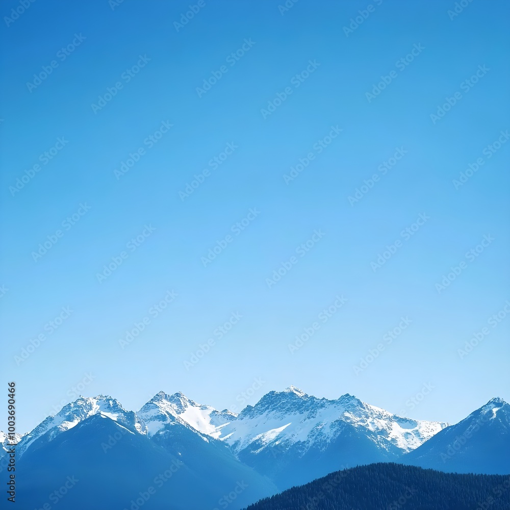 a range of snow-capped mountains under a clear blue sky. The mountains are in the lower part of the image, with their peaks covered in snow, creating a striking contrast against the bright blue sky a range of snow-capped mountains under a clear blue sky. The mountains are in the lower part of the image, with their peaks covered in snow, creating a striking contrast against the bright blue sky
