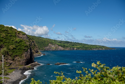 View of east coast cliffs, shoreline and ocean north of Hana Maui photo