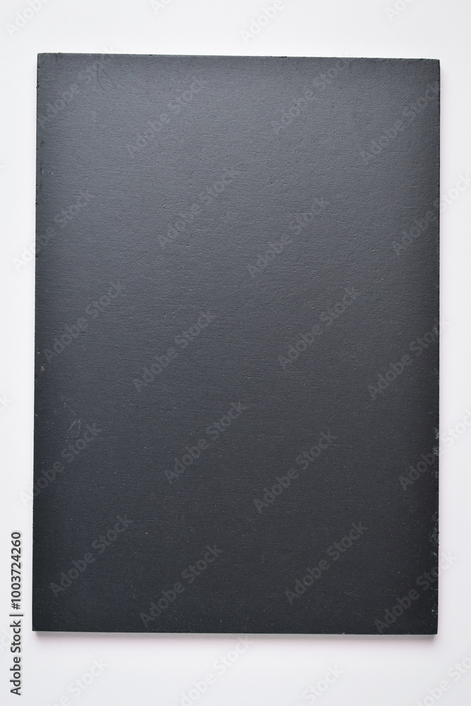 blank black notebook on white background blank black notebook on white background