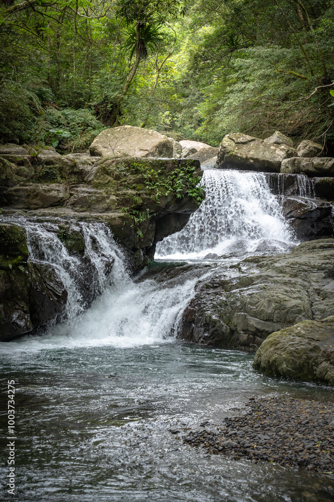 River goes like stair from the beautiful shape rocks, hidden in the forest, in Manyueyuan Forest Recreation Area, New Taipei City, Taiwan. River goes like stair from the beautiful shape rocks, hidden in the forest, in Manyueyuan Forest Recreation Area, New Taipei City, Taiwan.