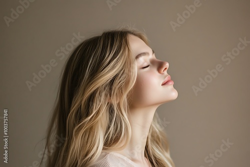 Woman with closed eyes enjoying a peaceful moment