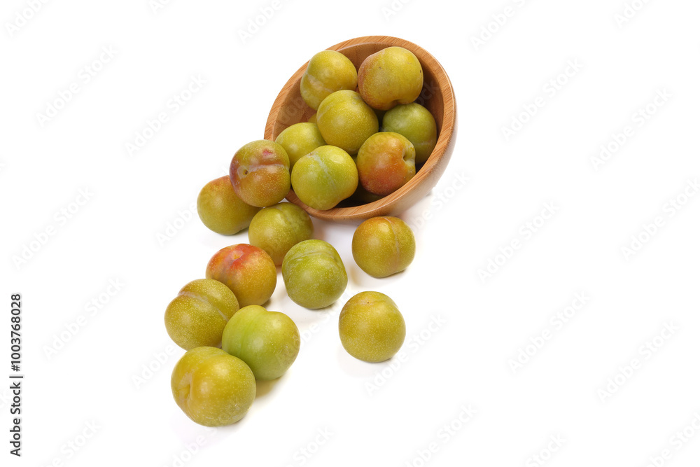 Ripe sweet small mini plum green maroon on white background Ripe sweet small mini plum green maroon on white background