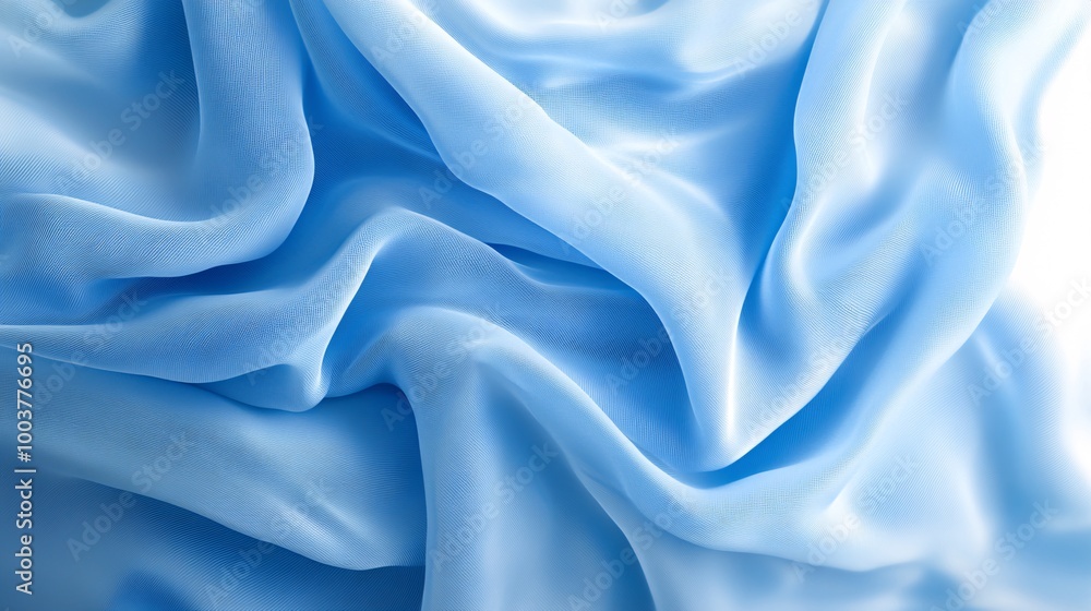 Obraz premium flowy light blue and white fabrics, soft light fabric and silk background