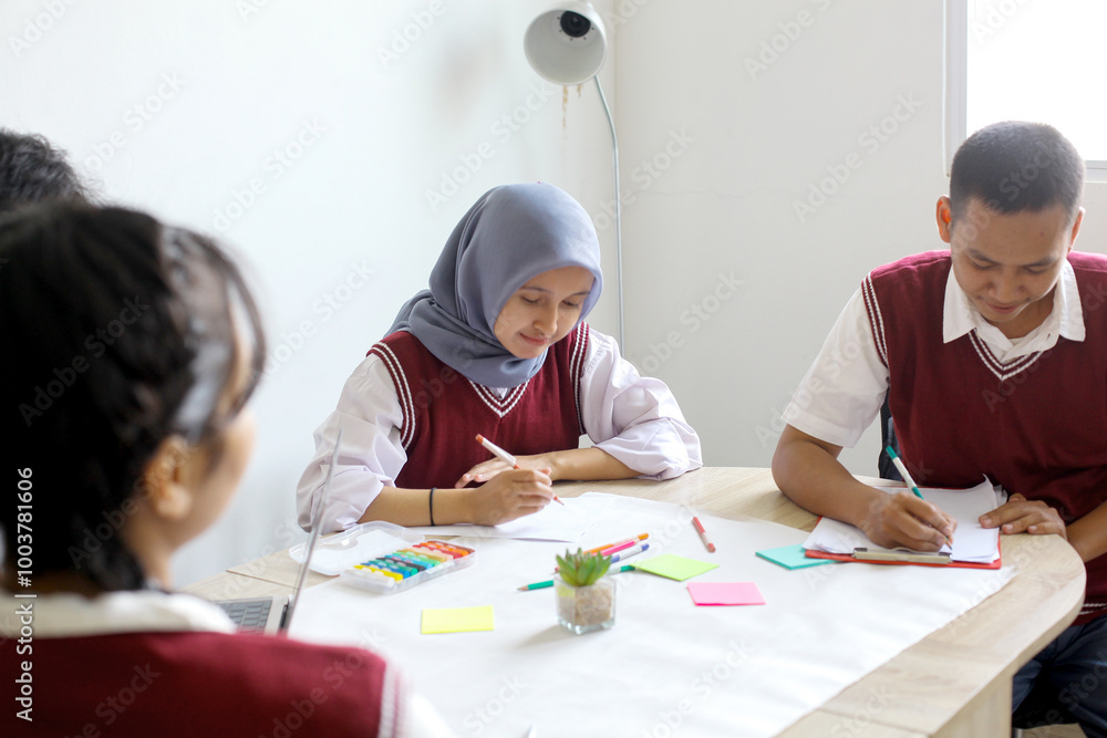 High School Students Doing School Work Together at The Study Room High School Students Doing School Work Together at The Study Room