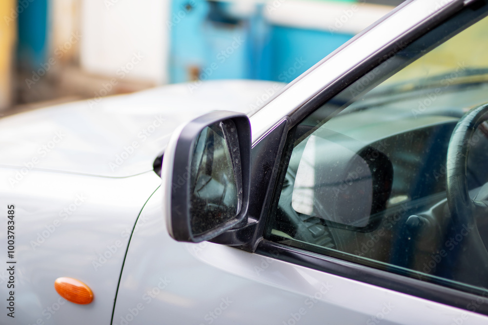 This is a detailed closeup view of a side mirror on a vehicle This is a detailed closeup view of a side mirror on a vehicle