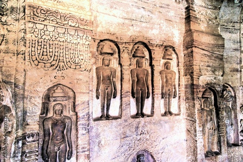 Jain Gods relief sculpture, Rock cut cave temple, Badami, Bagalkot, Karnataka, India photo