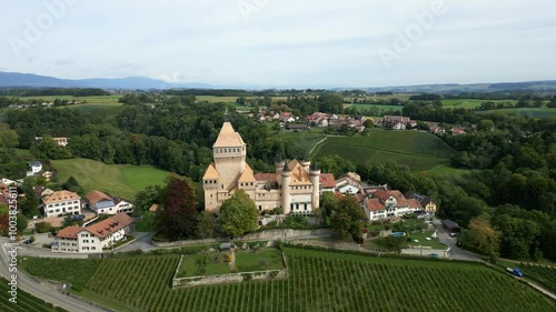 Orbit drone shot of magnificent Vufflens Castle in Vaud Switzerland photo