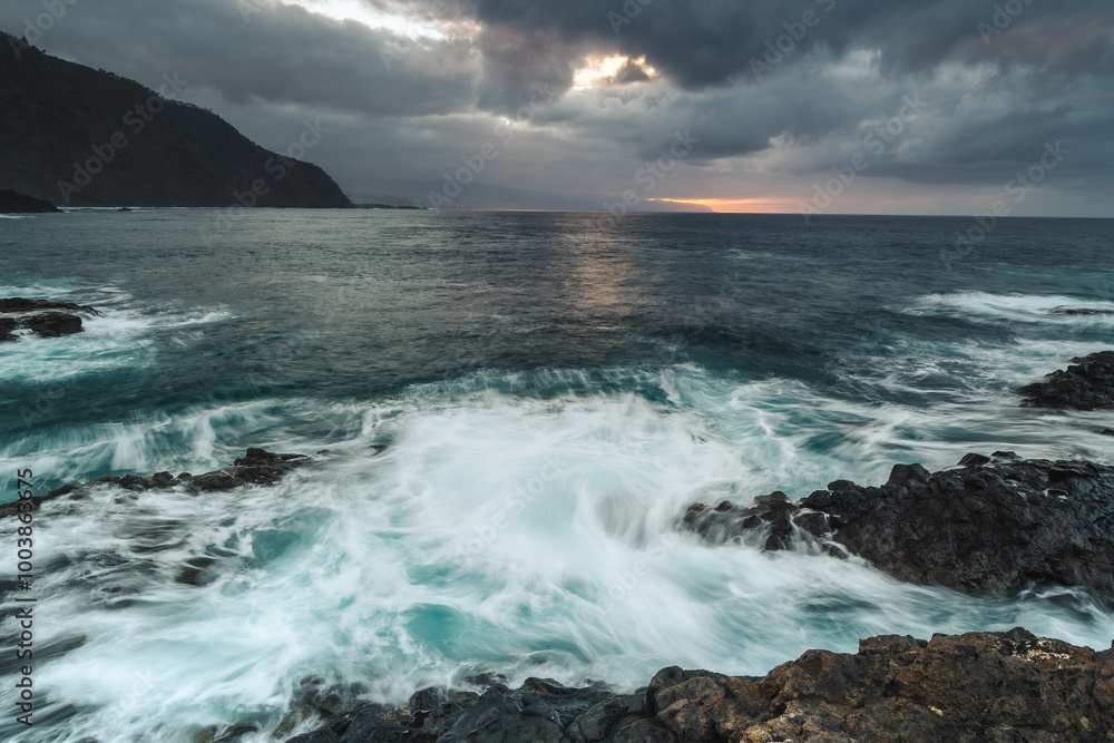 The coast of Tenerife in cloudy day with great waves. The coast of Tenerife in cloudy day with great waves.