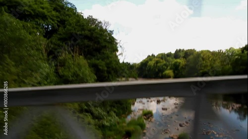 Side view, looking south of the River Wye from Lady Milfords or  Llanstephan Bridge, Powys, Wales, United Kingdom, wide angle