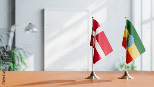 FLAGS OF DENMARK AND ETHIOPIA ON TABLE